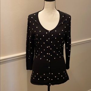 Black sweater with white polka dots
